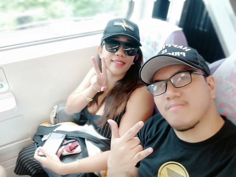 Me and Veronica riding in a monorail to Taipei