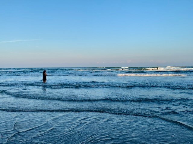 Mrs. TWM wading into the gulf