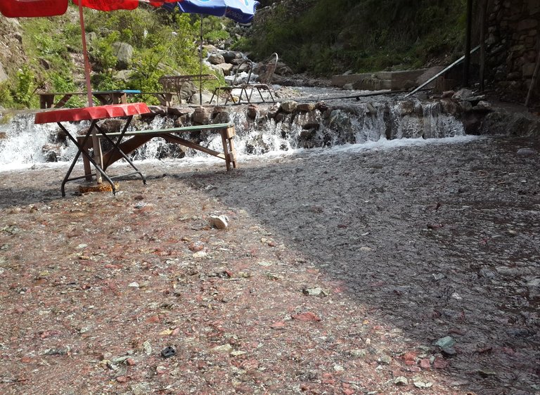 A water fall with a restaurant in its path, you can soak your feet in chilling cold water while snacking. Waterfall was high, and we found many restaurants up the hill.