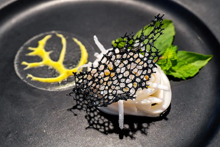 Steamed squid in ginger fish sauce with mango mousse