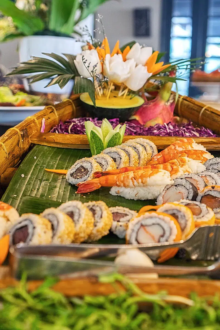 Different types of sushi with condiments.