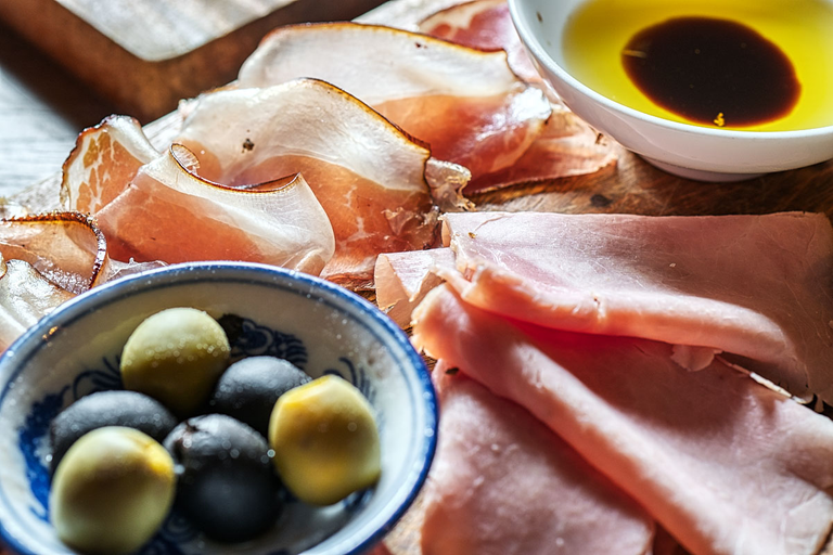 Freshly sliced cold cuts with condiments