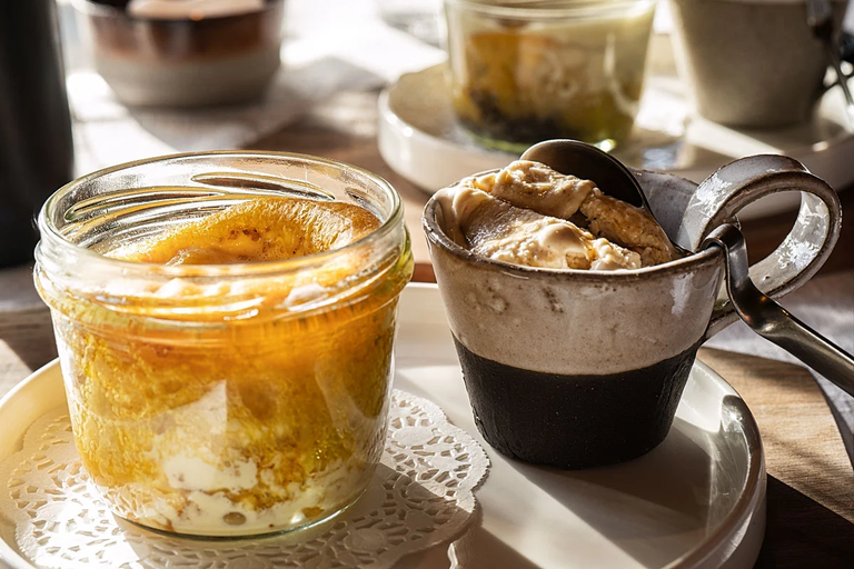 Potica, the traditional Slovenian roll in a jar with vanilla cream and walnut ice cream on the side