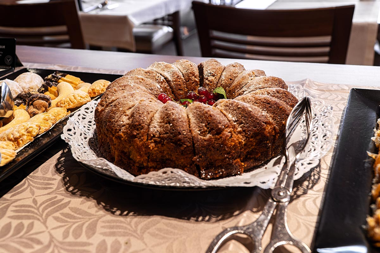 “Potica” is a traditional Slovenian dessert. In principle, it is baked rolled dough with walnut and raisin filling.