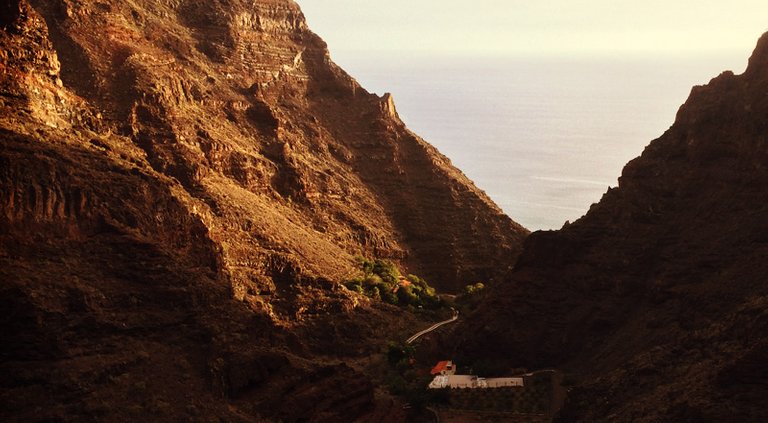 The ocean visible just before sunset on my hike down the canyon in Valle Gran Rey