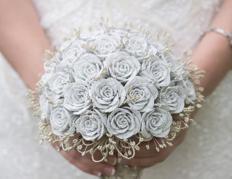 white_and_gold_beaded_rose_wedding_bouquet_by_slightly_caustic-d9piokg.jpg