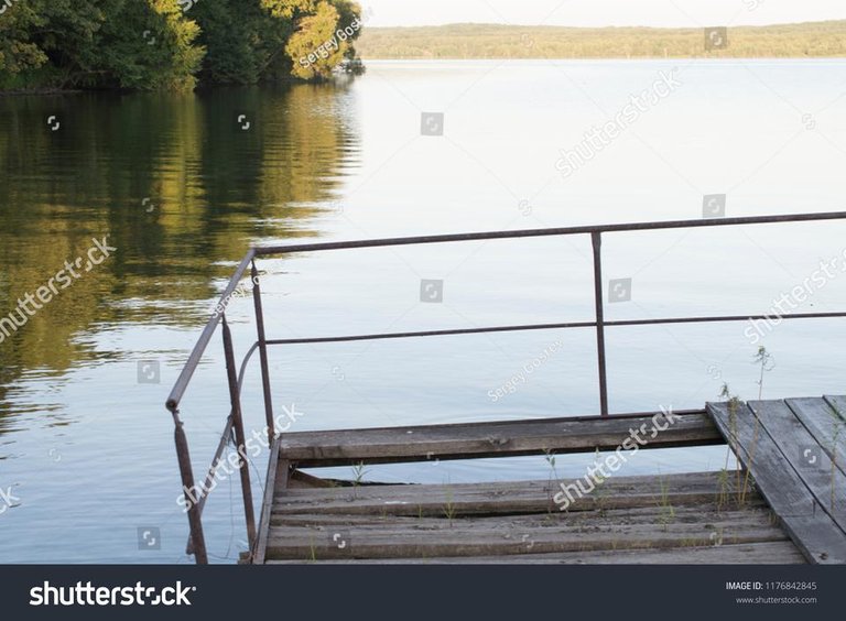 stock-photo-old-boat-dock-1176842845.jpg