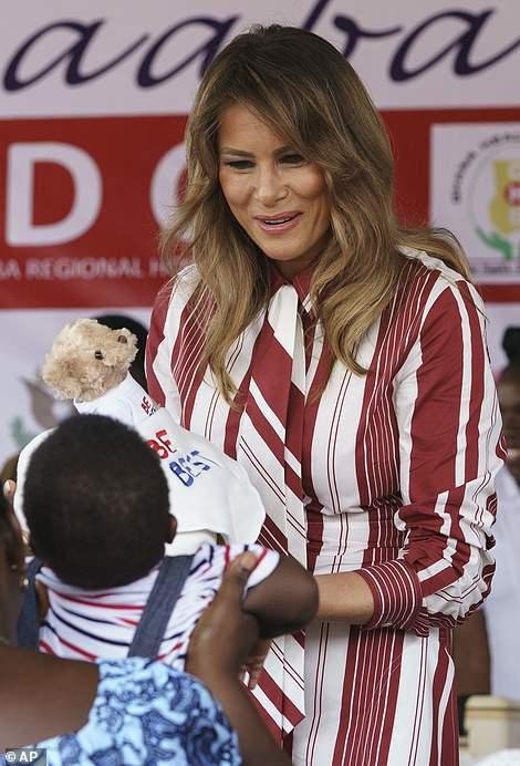 4701356-6231141-Bears_for_everybody_Melania_handed_a_teddy_and_a_blanket_both_of-a-36_1538661539349.jpg