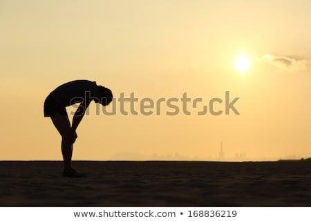 -exhausted-sportsman-sunset-horizon-450w-168836219.jpg