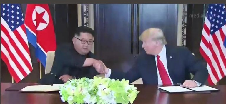 Trump and Kim Handshake.jpg