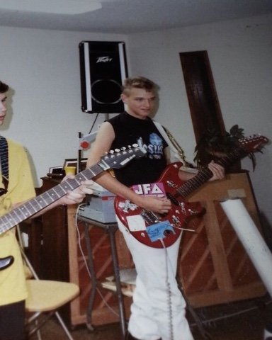 Mars playing guitar in church