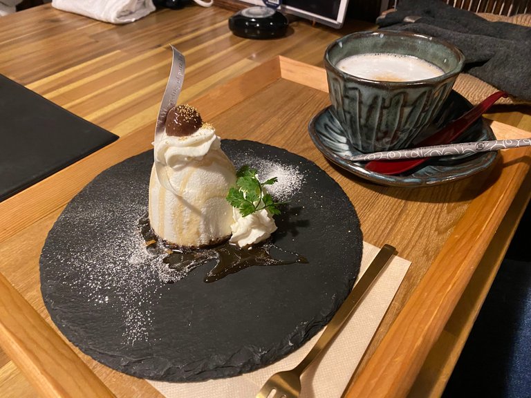 My friend's maroon mousse cake and cafe latte