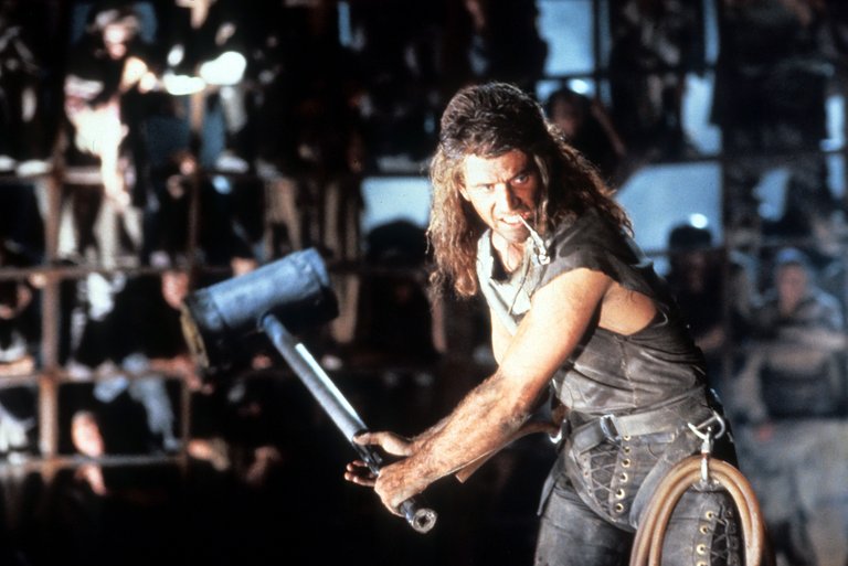 Max Rockatansky-- Mad Max, the Road Warrior-- fighting for his life in Bartertown's Thunderdome