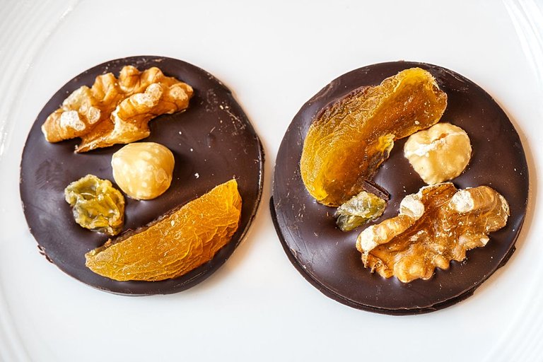handmade chocolate praline with apricot and nuts
