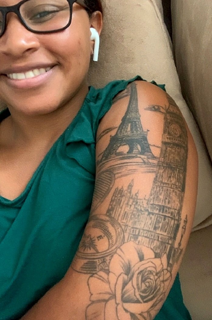 Travel tattoo idea Big Ben, the Eiffel Tower, a compass, and a rose