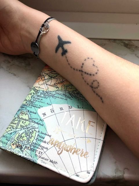 Travel tattoo idea airplane