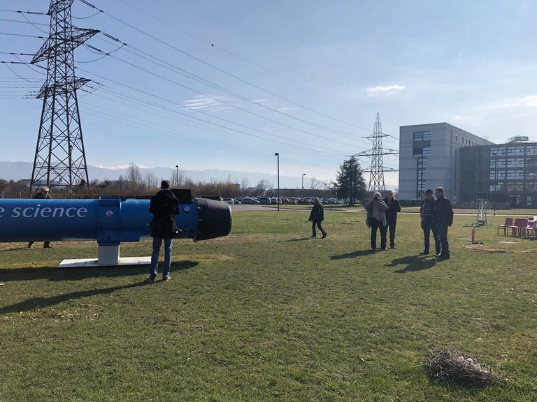 CERN visitors around an LHC dipole magnet