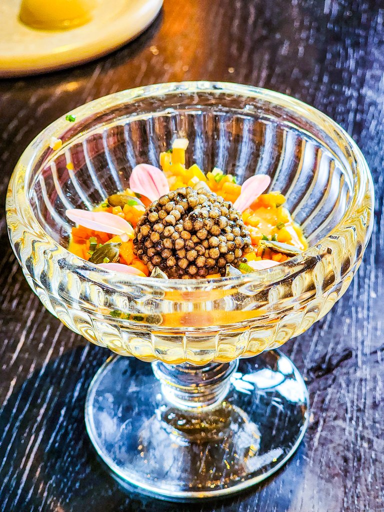 Decorative Glass Bowl with Caviar and Edible Flowers