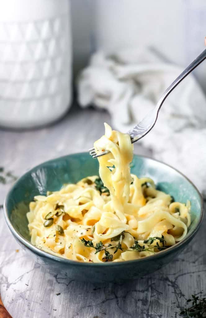 butternut squash pasta in blue bowl