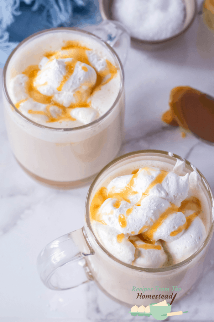 2 salted caramel lattes in glass mugs