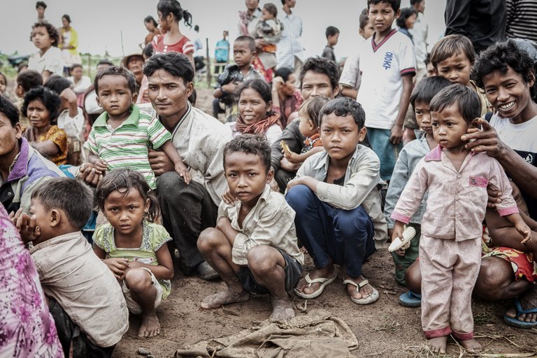 The villagers waiting for treatment