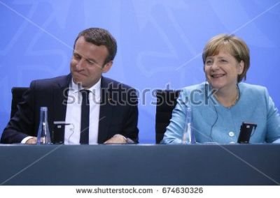 stock-photo-june-berlin-french-president-emmanuel-macron-german-chancellor-angela-merkel-at-the-674630326.jpg