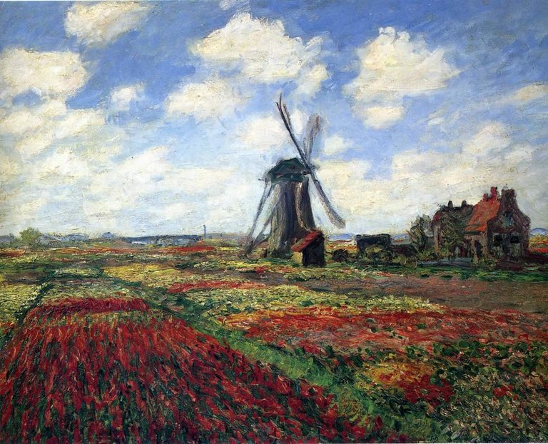 feild-of-tulips-in-holland-with-windmill.jpg