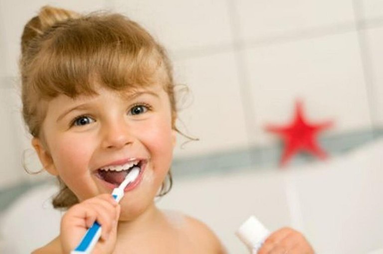 Little Girl Brushing Teeth