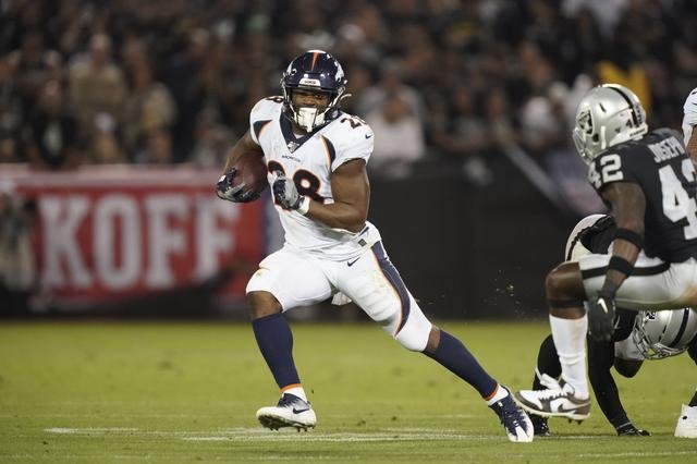 Denver Broncos running back Royce Freeman carries the ball in the second half against the Oakland Raiders at Oakland-Alameda County Coliseum in Oakland. The Raiders defeated The Broncos 24-16. Kirby Lee-USA TODAY Sports