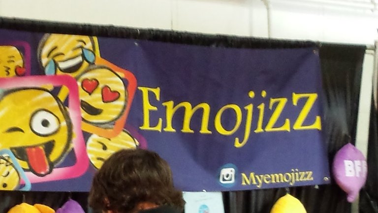 Banner with "Emojizz" as the company name