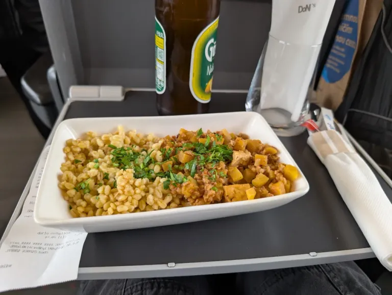 A small plate of curry and rice.