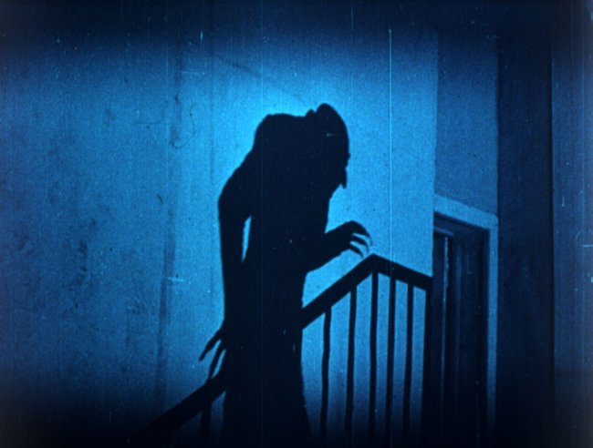 nosferatu-1922-max-schreck-as-count-orlok-climbing-the-stairs.jpg