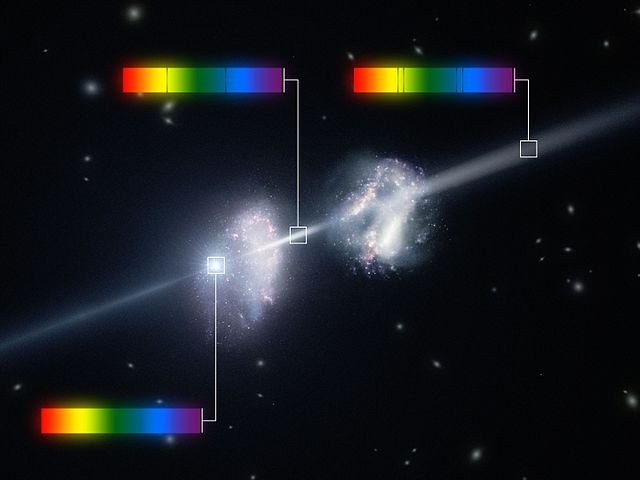 640px-Artist’s_impression_of_a_gamma-ray_burst_shining_through_two_young_galaxies_in_the_early_Universe.jpg