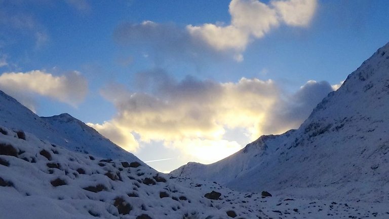 58 Sun setting over Beinn Fhada with aeroplane trail.jpg