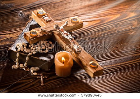 stock-photo-close-up-of-wooden-christian-cross-christianity-concept-579093445.jpg