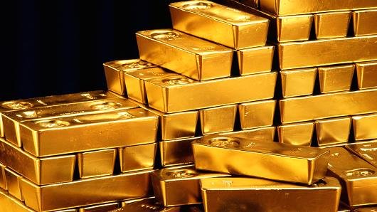 100281353-gold_bars_piles_gettyP.530x298.jpg