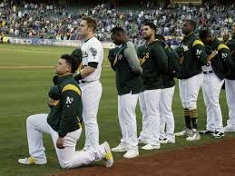 Oakland A's player becomes first MLB player to kneel during national anthem - CBS News.jpeg