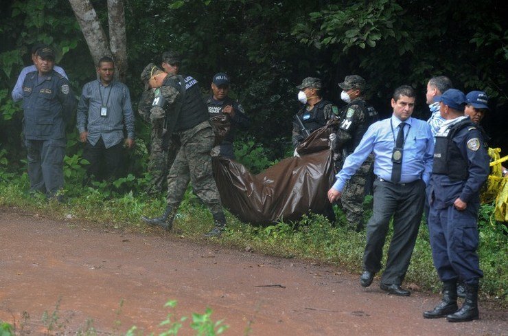 20141119-honduras-alvarado-crime-scene-afp_29A0E24945564D6D980BF826679D2068.jpg