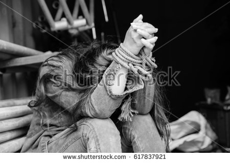 stock-photo-woman-hands-tied-up-with-rope-missing-kidnapped-abused-hostage-human-trafficking-concept-617837921.jpg