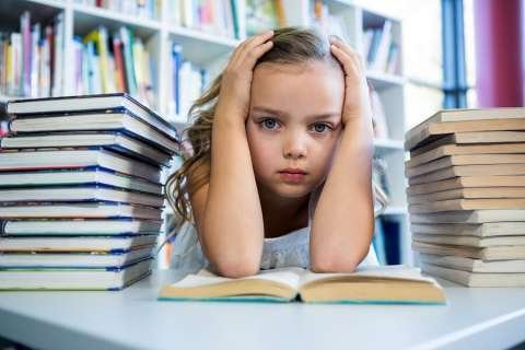 Stressed_Little_Girl_in_Library.jpg