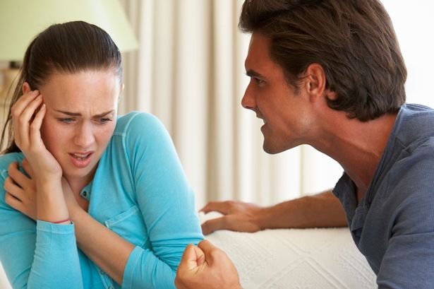 Man-Threatening-Woman-During-Argument-At-Home.jpg