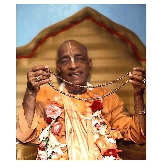 srila-prabhupada-and-beads 1.jpg