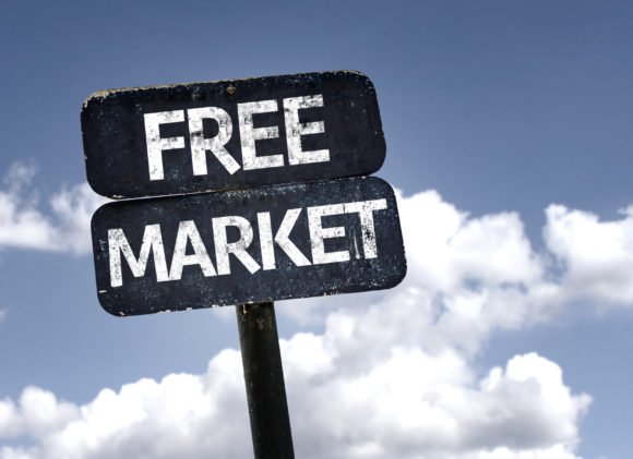 Free-Market-sign-with-clouds-580x421.jpg