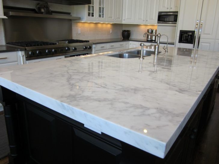 ddd8f8776f69346c9a46f391e0ba0979--white-and-gray-granite-countertops-white-kitchen-granite-countertops.jpg