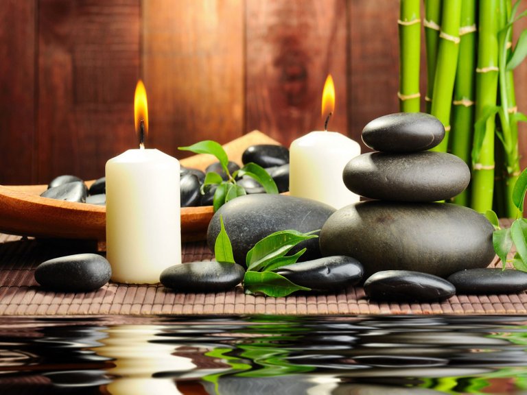 Spa_Life_-_Stones_and_Candles_on_Bamboo.jpg