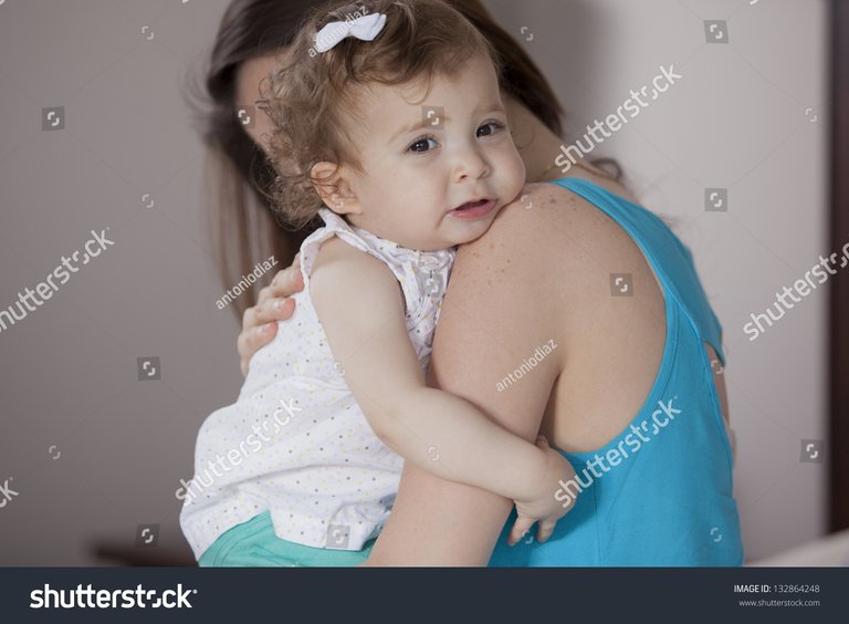 stock-photo-mom-comforting-her-baby-girl-132864248.jpg