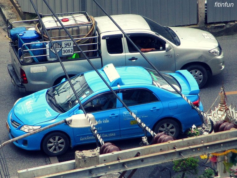 Bangkok Thailand friday sky blue taxi truck fitinfun.jpg