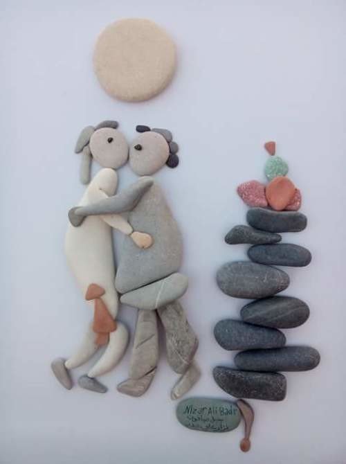 1465196979-love-is...-pebble-art-by-latakia-based-sculptor-nizar-ali-badr-syria.jpg