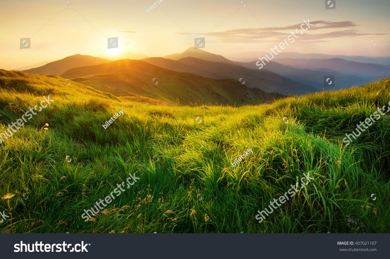 stock-photo-mountains-during-sunset-beautiful-natural-landscape-in-the-summer-time-407021107.jpg