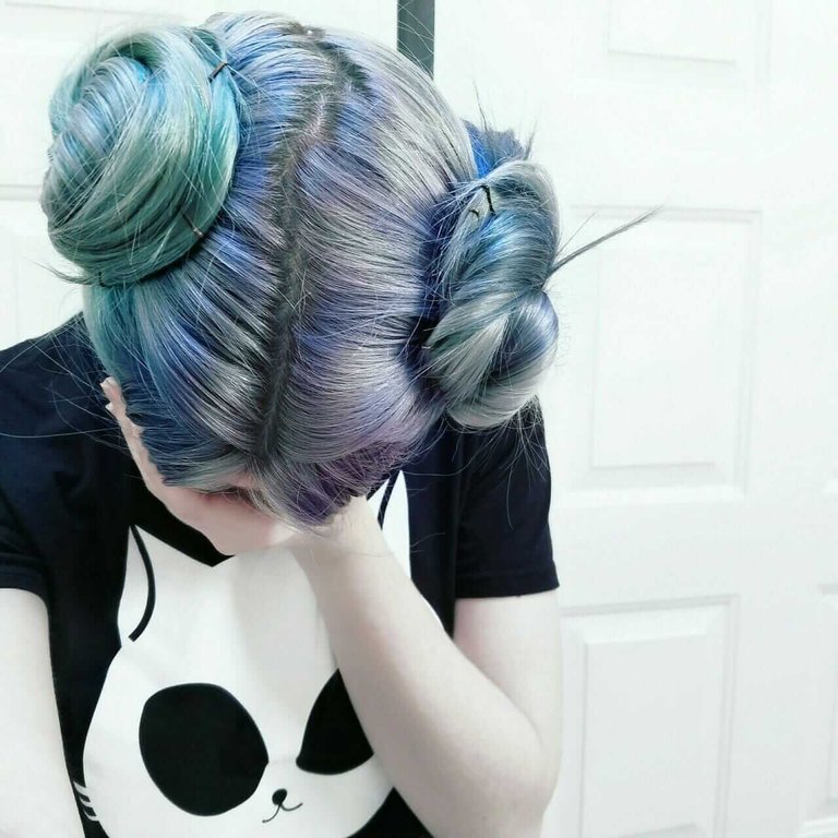 Grunge-dyed-turquoise-and-blue-hair-with-buns.jpg